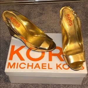 Selling Size 9 Gold Michael Kors 3/4inch heels